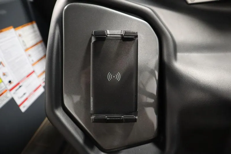 Slide: The Image of 2024 Supreme ZS232 wireless phone charging dock in black interior. - 26