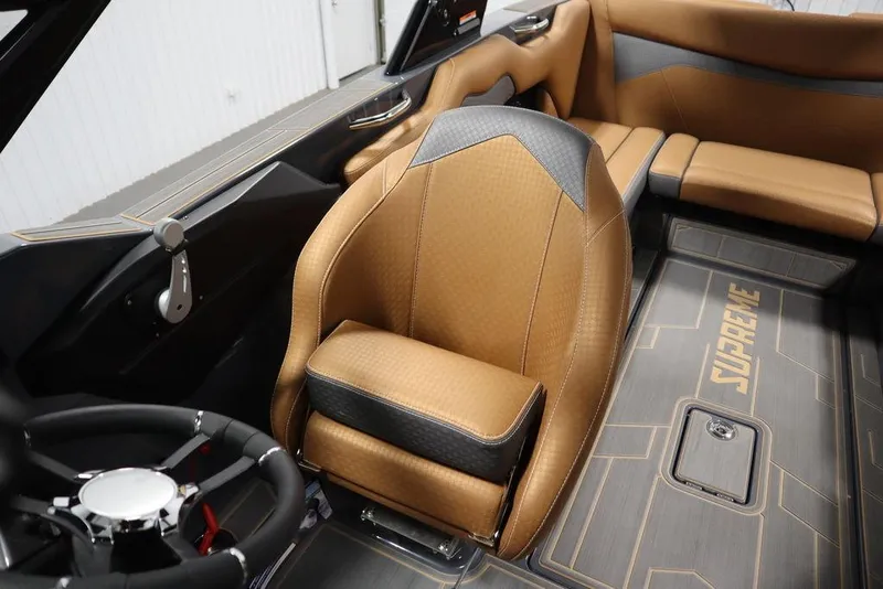 Slide: The Image of 2024 Supreme ZS232 boat interior with tan leather seats and modern design. - 40