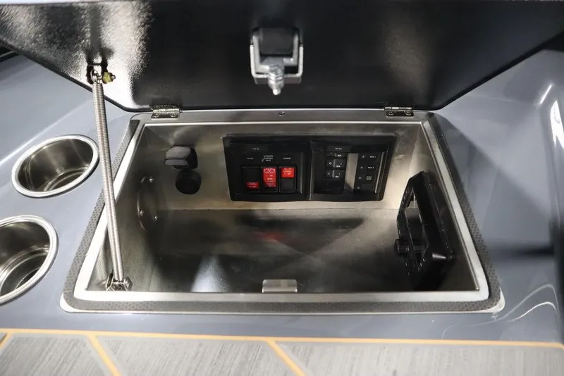 Slide: The Image of 2024 Supreme ZS232 boat control panel with cup holders. - 42