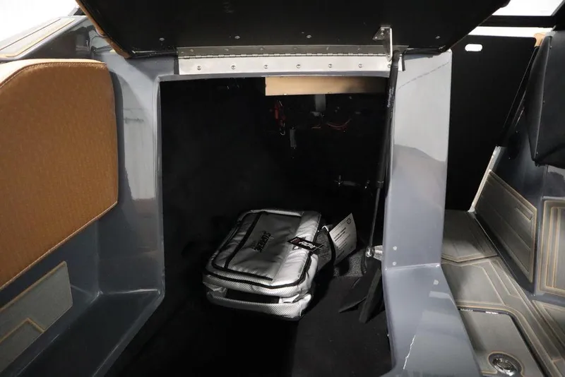 Slide: The Image of 2024 Supreme ZS232 boat storage compartment with a bag inside. - 45