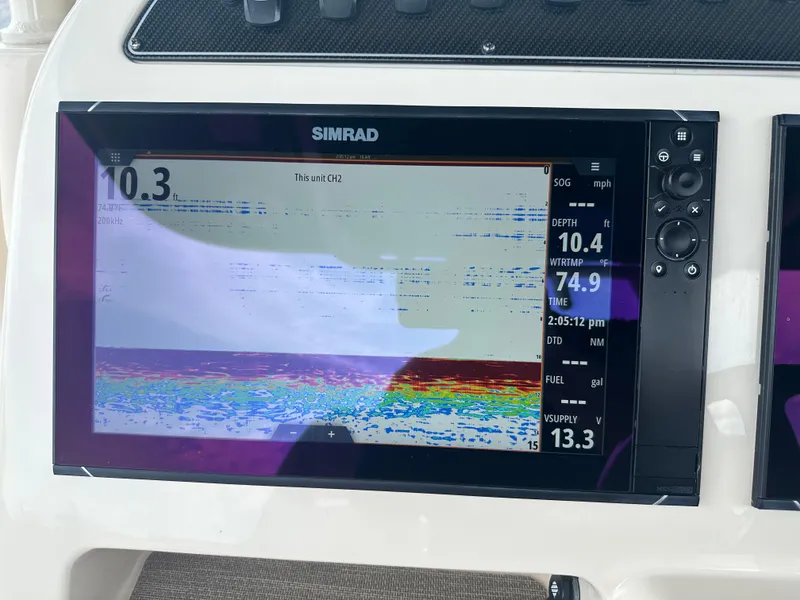 Slide: The Image of Simrad fishfinder display on 2020 Grady-White Canyon 336 boat. - 18