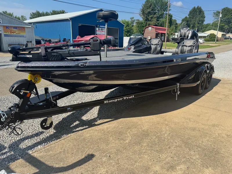 Slide: The Image of 2024 Ranger Z521R CUP fishing boat on trailer in outdoor setting. - 10
