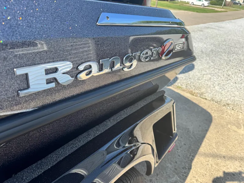 Slide: The Image of 2024 Ranger Z521R CUP boat rear view with logo and model details. - 12