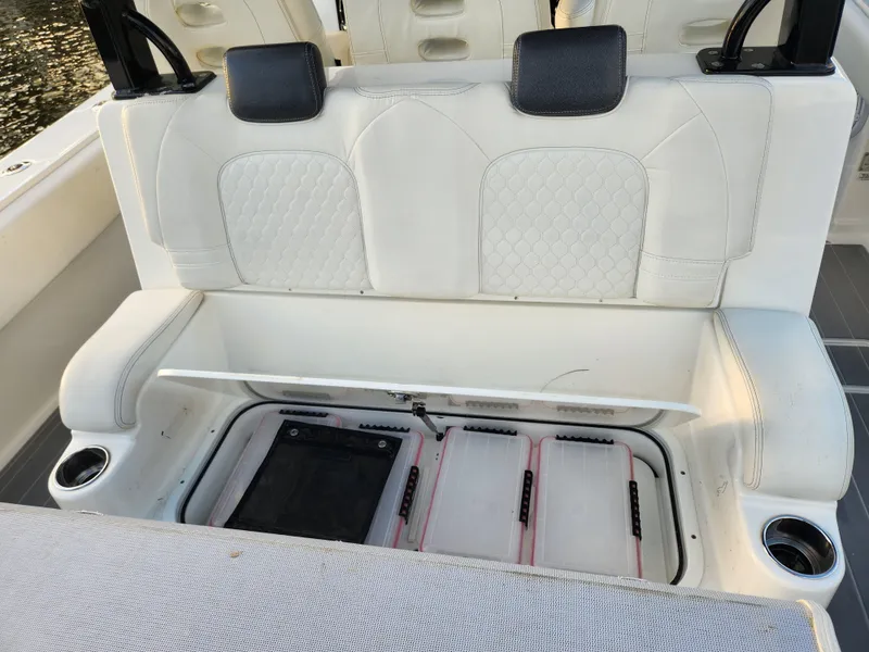 Slide: The Image of 2019 HCB 39 Speciale boat seat with storage compartment open. - 17