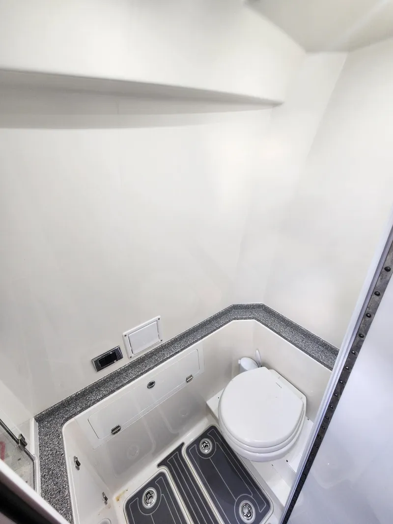 Slide: The Image of 2019 HCB 39 Speciale boat bathroom with modern fixtures and compact design. - 29