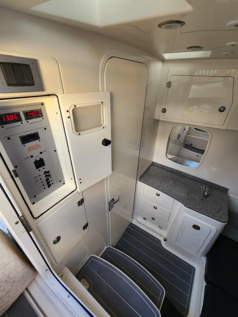Slide: The Image of 2019 HCB 39 Speciale interior with control panel, storage, and sink. - 3