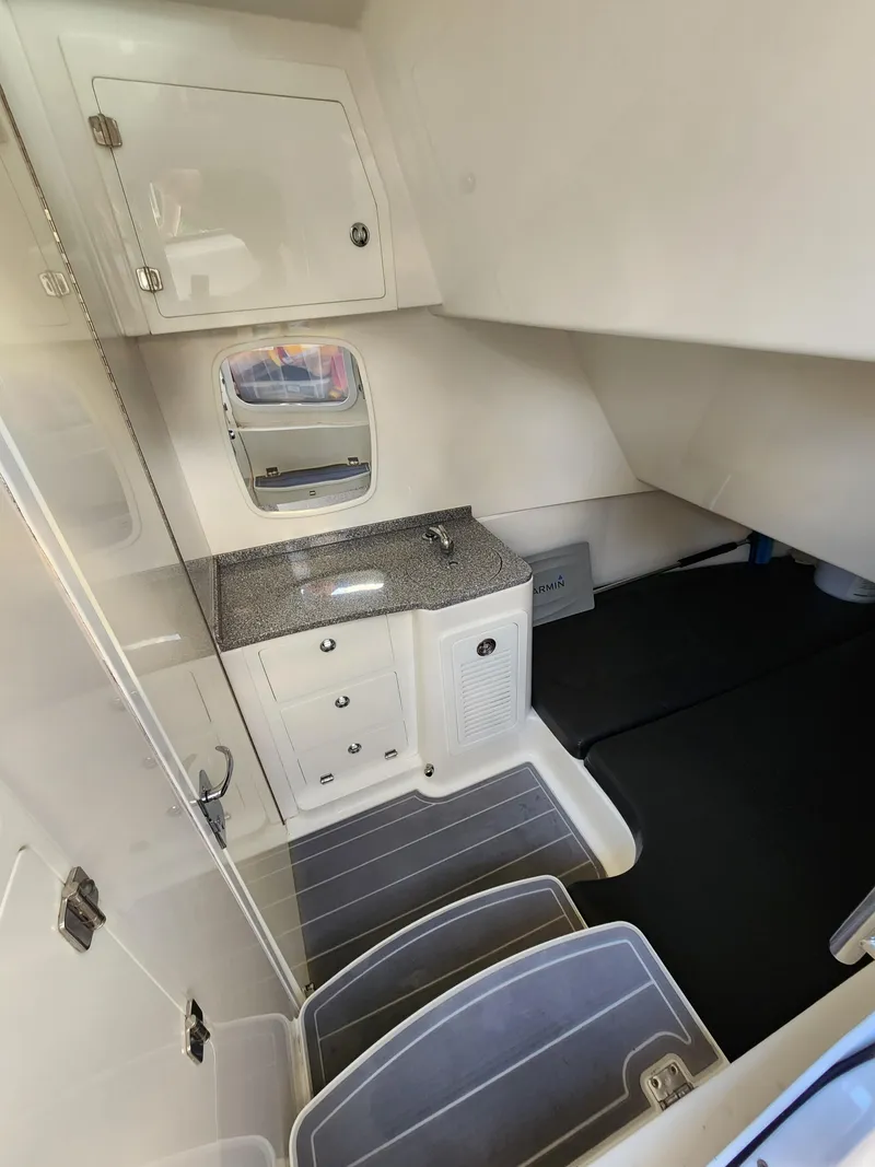 Slide: The Image of 2019 HCB 39 Speciale cabin interior with sink, storage, and seating area. - 31