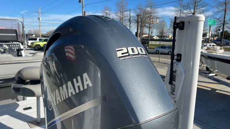 Slide: The Image of 2019 Xpress H24B boat with Yamaha 200 horsepower outboard motor. - 14