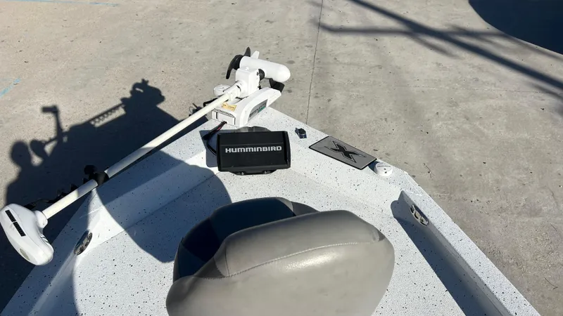 Slide: The Image of 2019 Xpress H24B boat with Humminbird fish finder and trolling motor. - 8