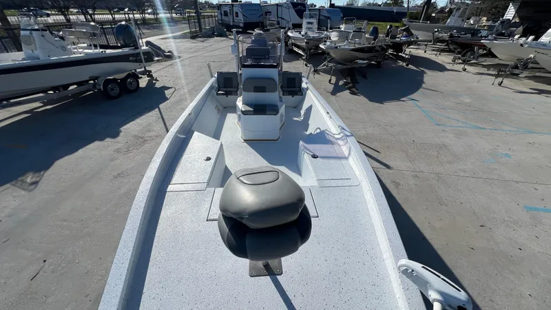 Slide: The Image of 2019 Xpress H24B fishing boat on display at a marina. - 9