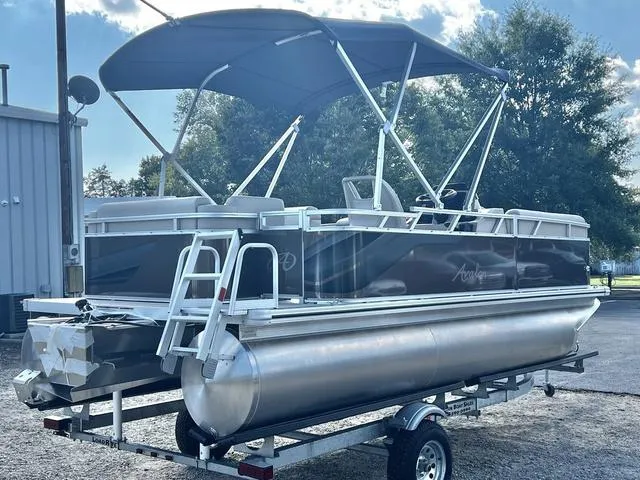 Slide: The Image of 2024 Avalon VTX 19 Cruise pontoon boat on trailer, in stock. - 5