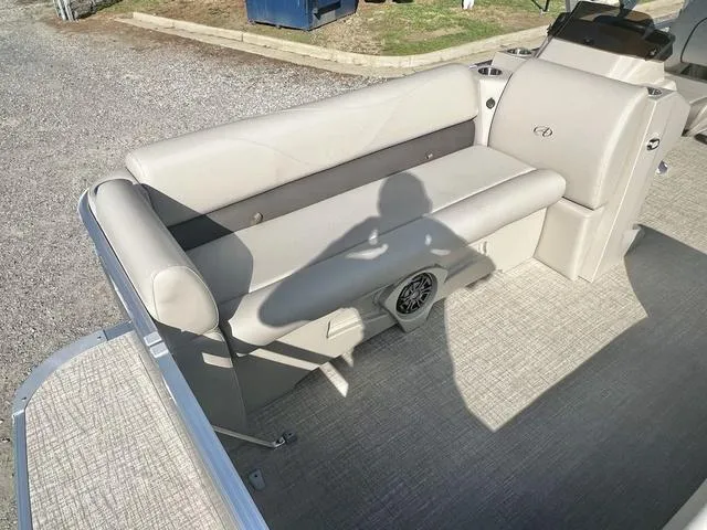 Slide: The Image of 2024 Avalon VTX 19 Cruise pontoon boat interior seating area. - 9