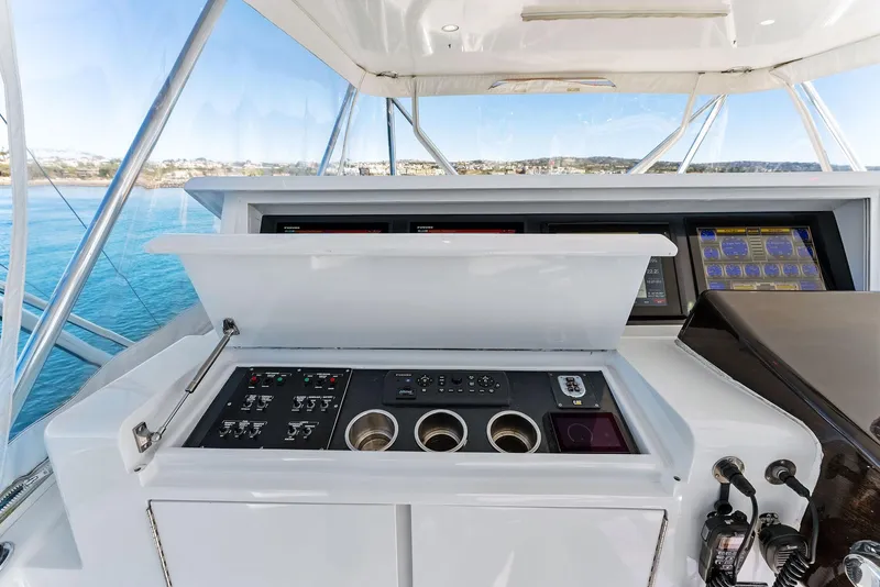 Slide: The Image of Control panel of a 2007 Hatteras 64 Convertible yacht with ocean view. - 37