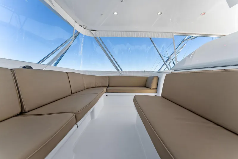 Slide: The Image of Interior seating area of 2007 Hatteras 64 Convertible yacht with panoramic windows. - 41