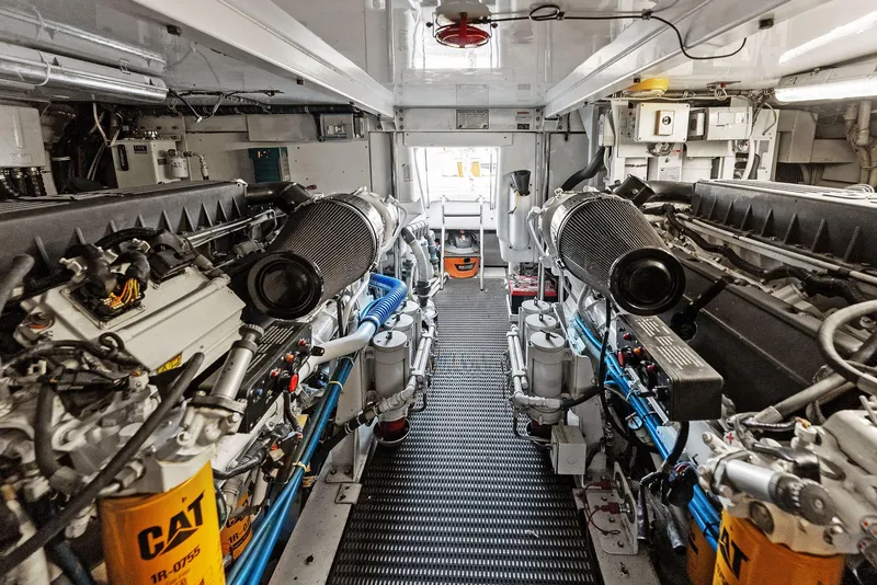 Slide: The Image of Engine room of a 2007 Hatteras 64 Convertible yacht with dual CAT engines. - 49