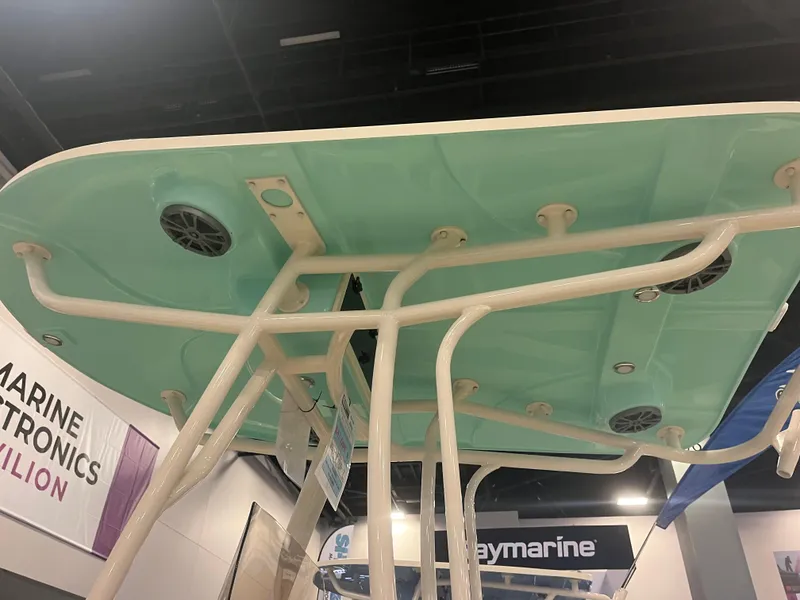 Slide: The Image of 2024 Carolina Skiff 24 Ultra Elite boat top view at a marine electronics exhibition. - 16