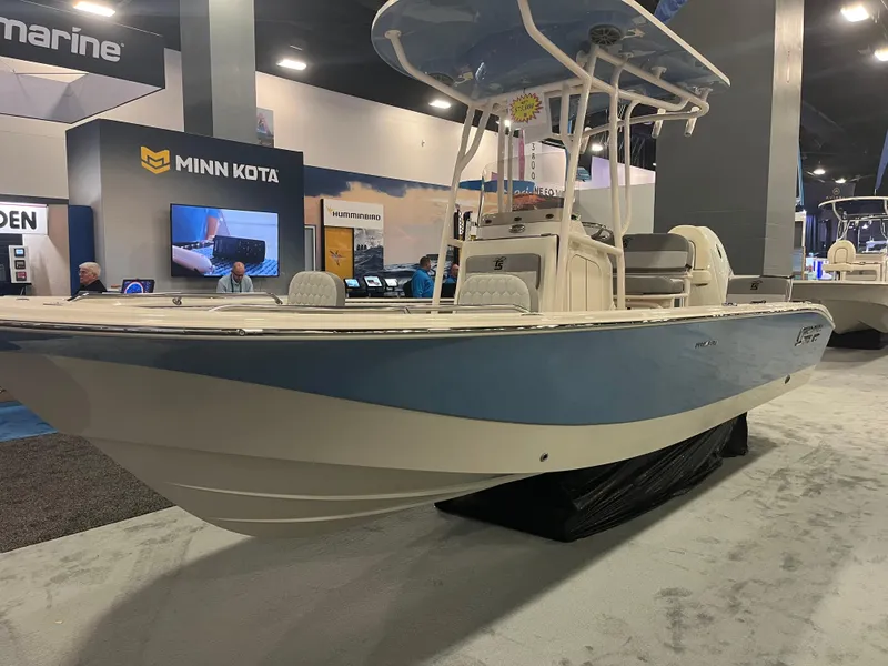 Slide: The Image of 2024 Carolina Skiff 22 Ultra Elite boat displayed at a marine exhibition. - 15