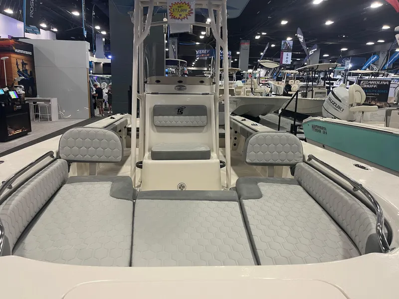Slide: The Image of 2024 Carolina Skiff 22 Ultra Elite boat interior at a boat show. - 19