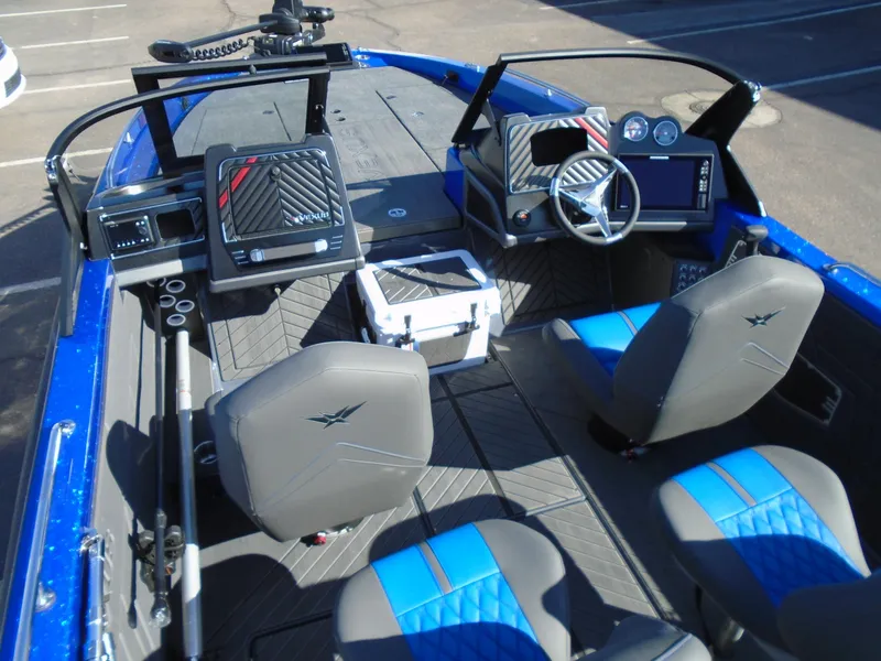 Slide: The Image of 2024 Vexus DVX20S boat interior with modern dashboard and seating. - 12