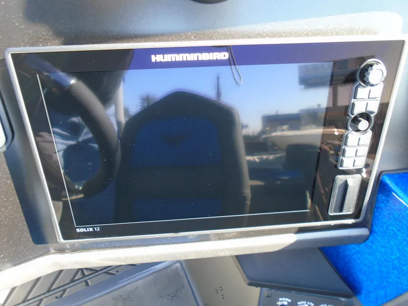 Slide: The Image of Humminbird Solix 12 fishfinder on 2024 Vexus DVX20S boat dashboard. - 15