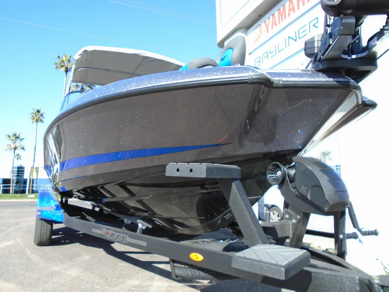 Slide: The Image of 2024 Vexus DVX20S boat on trailer, close-up view. - 26
