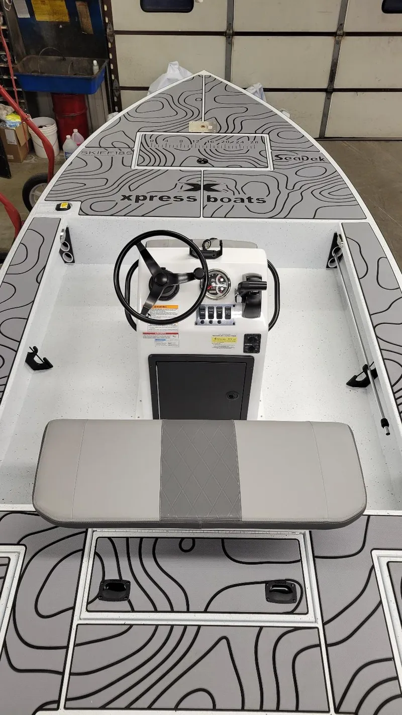 Slide: The Image of 2025 Xpress Skiff 185 with Yamaha Vmax 115 SHO, featuring sleek design and modern console. - 17