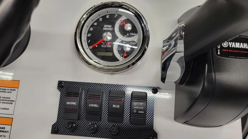 Slide: The Image of Dashboard of 2025 Xpress Skiff 185 with Yamaha Vmax 115 SHO controls and gauges. - 22