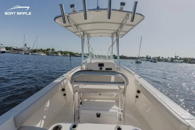 Slide: The Image of 2023 Sailfish 220 CC center console boat on calm water. - 7