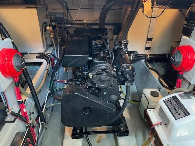 Slide: The Image of Engine compartment of a 1989 Sea Ray 390 Express Cruiser boat. - 11