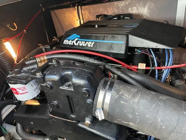 Slide: The Image of Engine compartment of a 1989 Sea Ray 390 Express Cruiser with MerCruiser engine. - 13