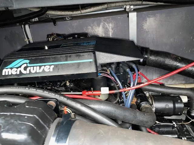 Slide: The Image of Engine of 1989 Sea Ray 390 Express Cruiser with MerCruiser components. - 15