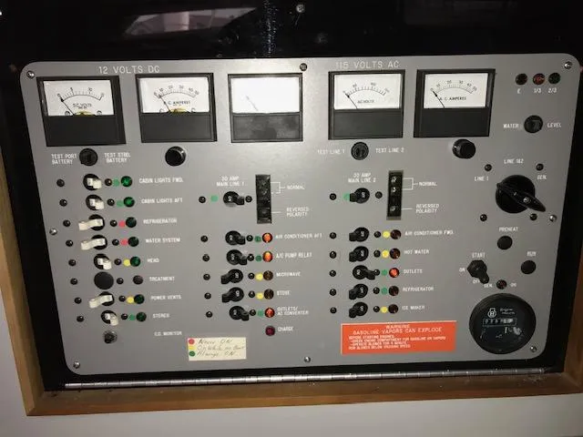 Slide: The Image of Control panel of a 1989 Sea Ray 390 Express Cruiser boat. - 17