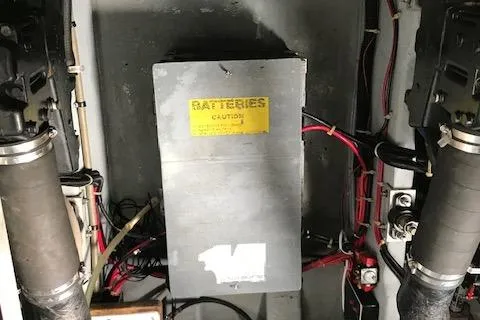 Slide: The Image of Battery compartment of a 1989 Sea Ray 390 Express Cruiser. - 19