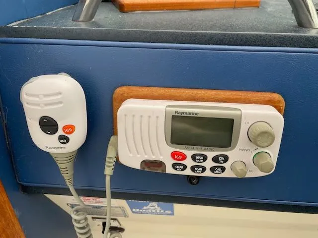 Slide: The Image of Raymarine marine radio on 1989 Sea Ray 390 Express Cruiser dashboard. - 38