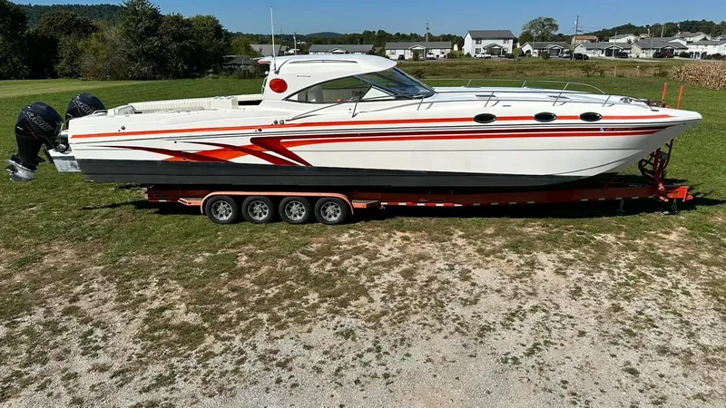 The Image of 2009 Eliminator 47' Cat boat on a trailer, side view. - 1