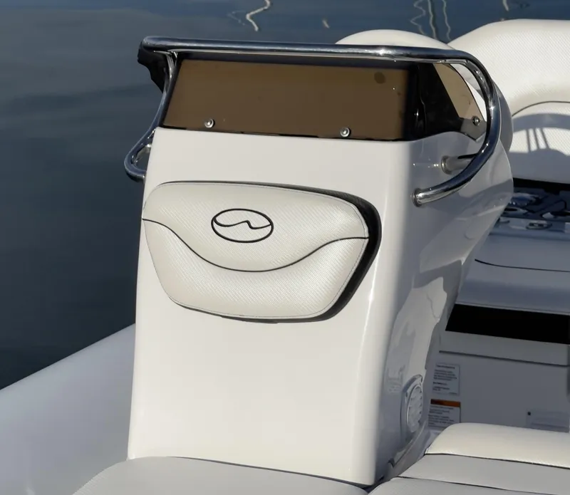 Slide: The Image of 2024 Walker Bay Generation 13 LTE boat console with cushioned backrest. - 6