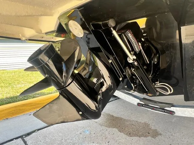 Slide: The Image of Close-up of 2023 Bayliner DX 2050 boat propeller and outboard motor. - 6