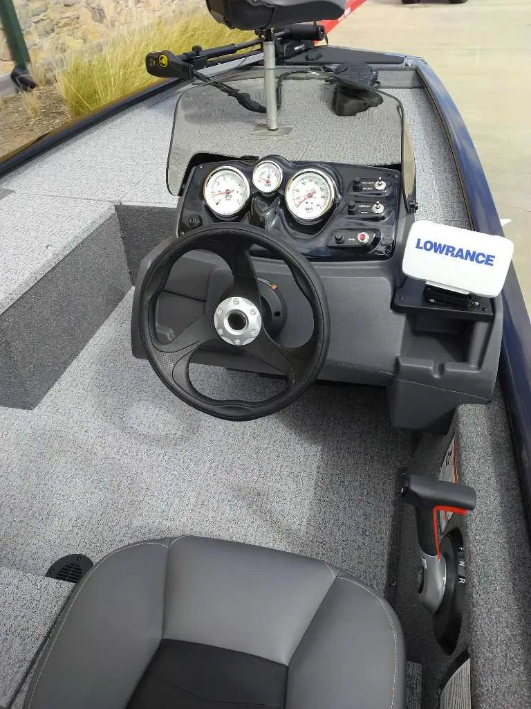 Slide: The Image of 2024 Tracker Pro 170 boat dashboard with Lowrance fishfinder. - 7