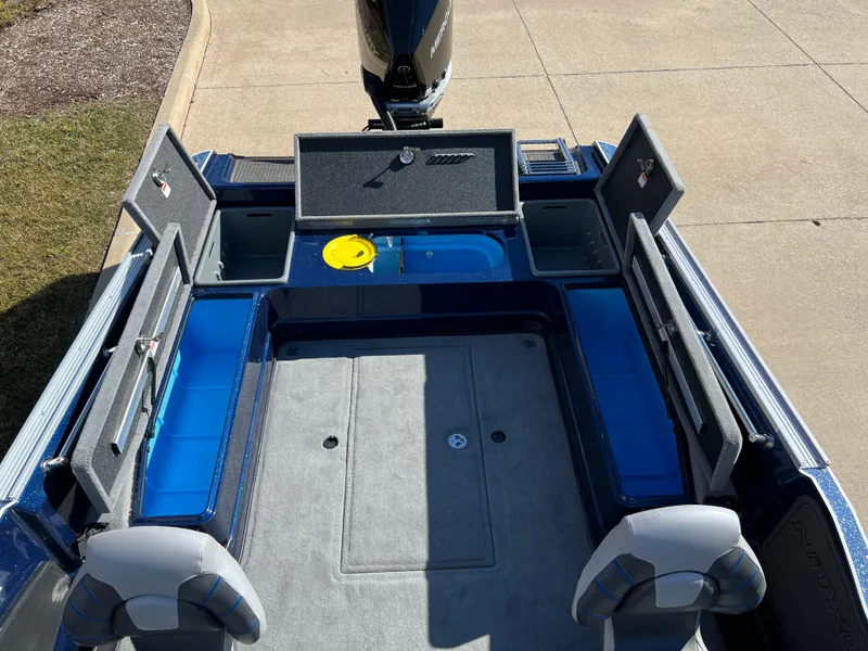 Slide: The Image of 2024 Nitro ZV21 boat interior with storage compartments and seating. - 4