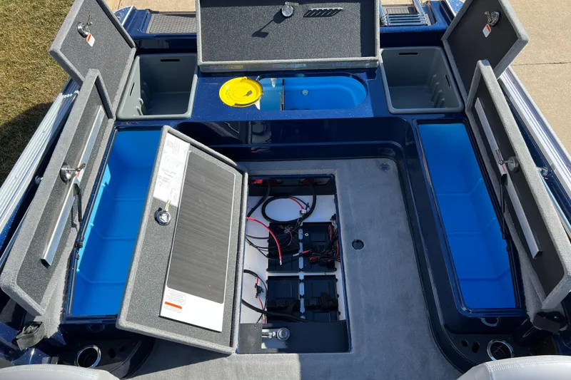 Slide: The Image of 2024 Nitro ZV21 boat storage compartments and battery area. - 5