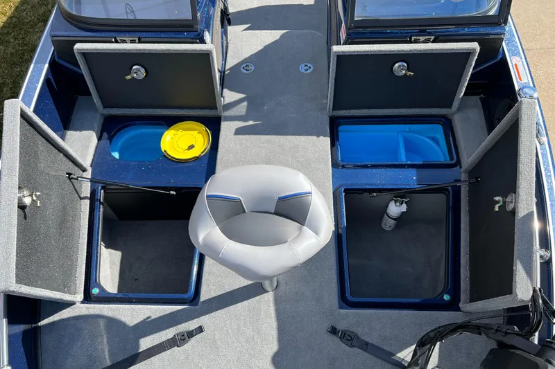 Slide: The Image of 2024 Nitro ZV21 boat interior with open storage compartments and seating. - 6