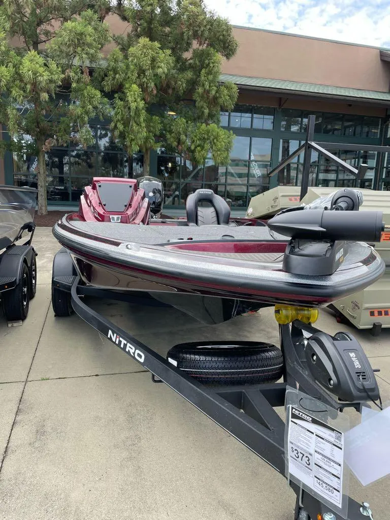 Slide: The Image of 2024 Nitro Z18 bass boat on trailer, displayed outdoors. - 3