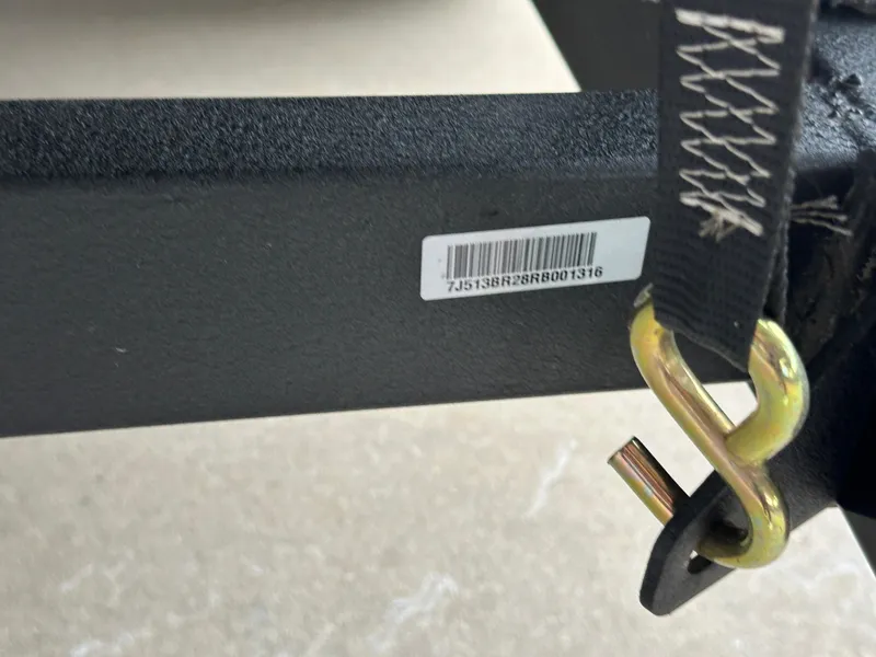 Slide: The Image of 2024 Ranger Reata 220C boat interior with luxurious seating and modern steering wheel. - 20