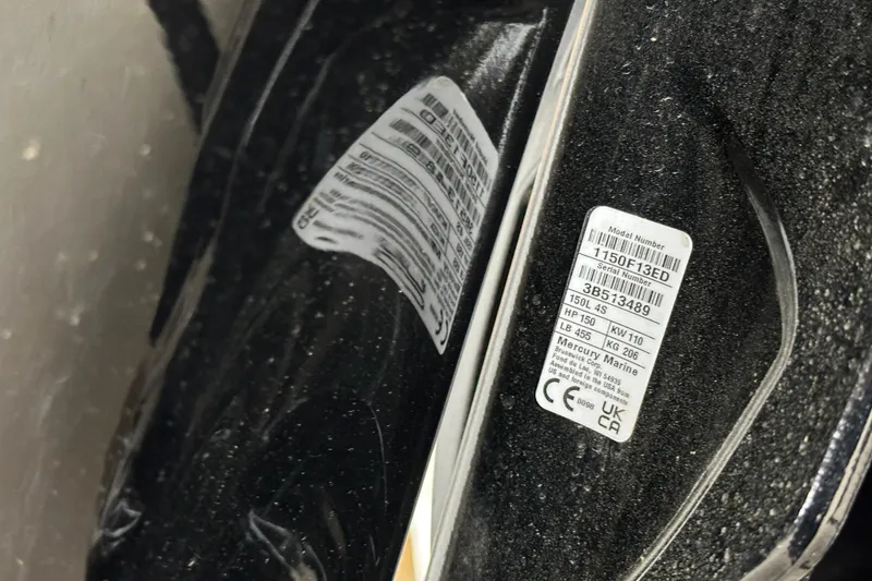 Slide: The Image of Close-up of 2024 Ranger Reata 220C model and serial number labels. - 29