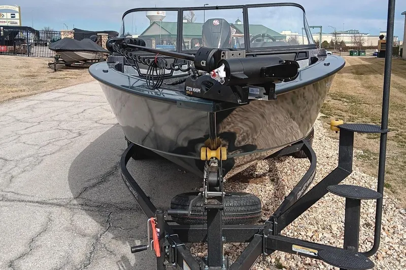 Slide: The Image of 2024 Ranger VX1988 WT fishing boat on a trailer, front view. - 2