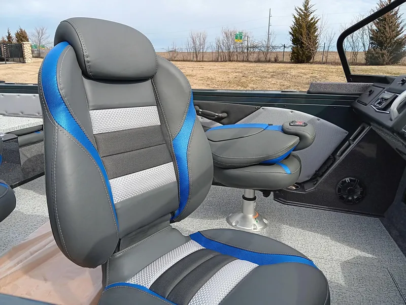 Slide: The Image of 2024 Ranger VX1988 WT boat interior with gray and blue seats. - 7