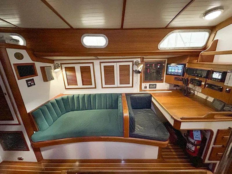 Slide: The Image of Interior of 1996 Hinckley Sou'wester 42 MKII with wooden cabinets and storage compartments. - 22