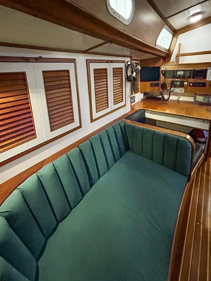 Slide: The Image of Cabin interior of 1996 Hinckley Sou'wester 42 MKII with shelves and dishware. - 23