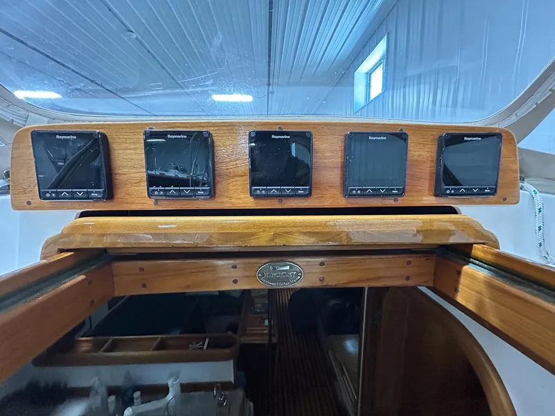 Slide: The Image of Hinckley Sou'wester 42 MKII 1996 sailboat in storage, showcasing deck and railing details. - 10