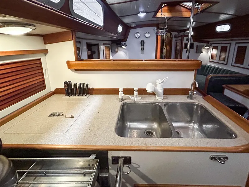 Slide: The Image of Interior of 1996 Hinckley Sou'wester 42 MKII yacht kitchen with stove and sink. - 17